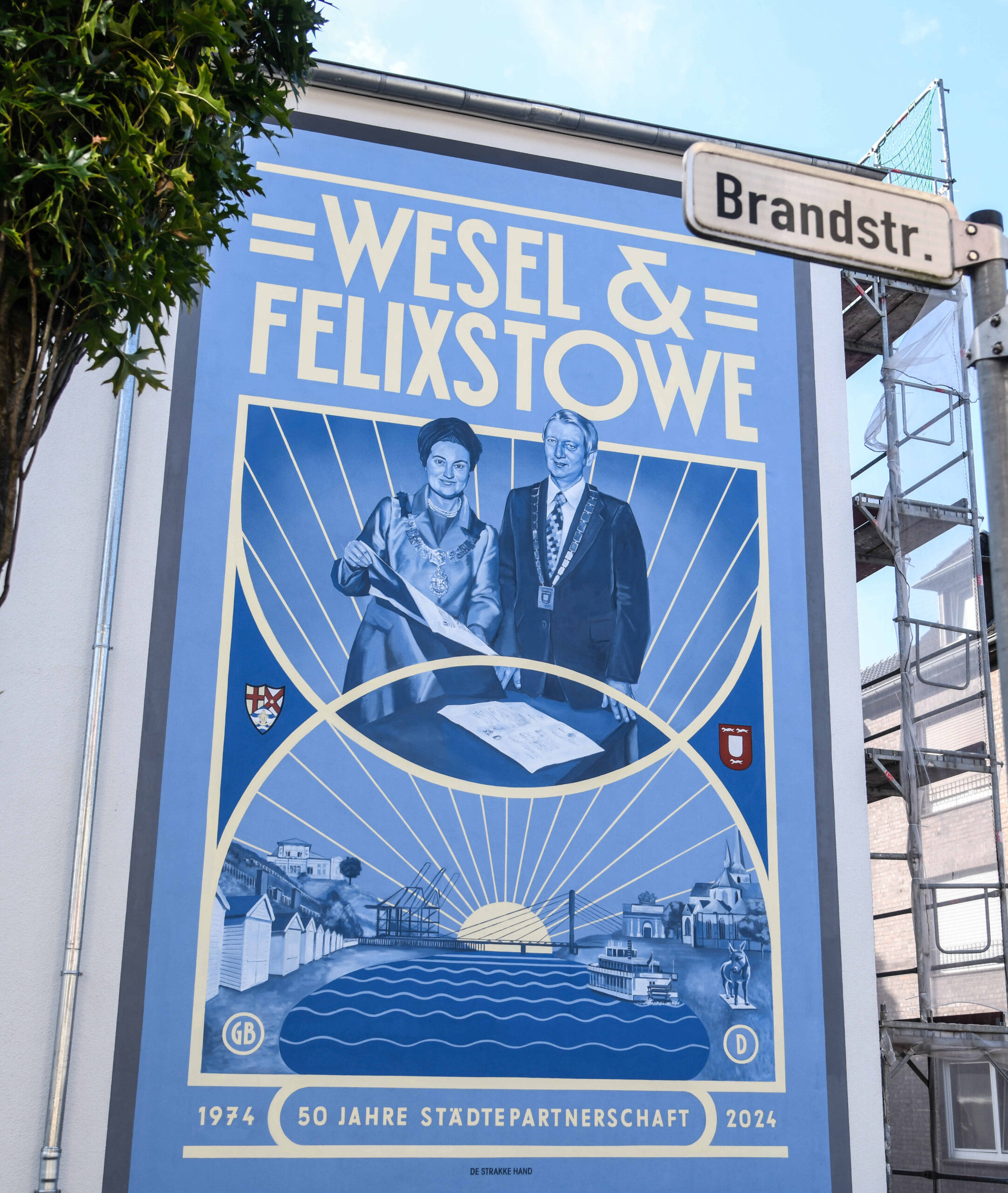 Vorstellung des Wandbildes "50 Jahre Städtepartneschaft Wesel - Felixstowe 1974 - 2024", Brandstraße/Ecke Tückingstraße, am Sonntag, 22.09.2024 in Wesel.
Foto: Markus Joosten / Stadt Wesel.